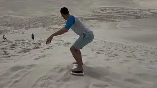 Sand boarding on Lancelin Dunes Western Australia