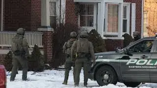 Police standoff with man armed with sword in Ypsilanti enters second day