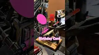 Printing some pink birthday greeting cards with a tabletop printing press