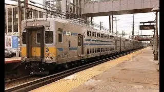 MTA LIRR Long Island Railroad commuter service to Long Island City arrives at Mineola, NY
