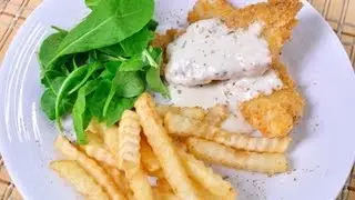 ฟิชแอนด์ชิปส์ (ปลาชุบแป้งทอดและมันฝรั่งทอด) Fish & Chips