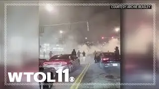 Toledo man urges safety after sharing video of mass of people, cars doing donuts in city intersectio