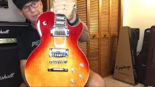 Is the Epiphone Les Paul Modern Figured Magma Orange Fade worth the asking price? What do you think?