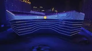 Stunning LED facade lighting turns this building into a glowing urban landmark