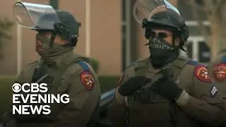 States race to secure capitols amid threats of armed protests
