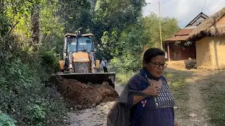After Heavy Rain Remote Hilly Villagers Face Problems JCB Resurfacing Road