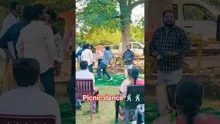 A joyful picnic dance celebration filled with music.