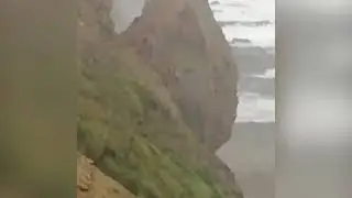 The moment a Cornish woman captures a cliff falling