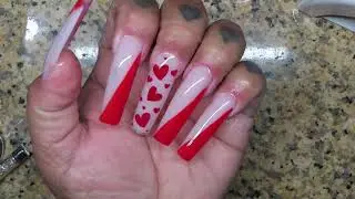 Red side French nails with hearts
