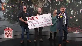 Bluegrass World of Wheels presents their check for Jude's Jingle Tree