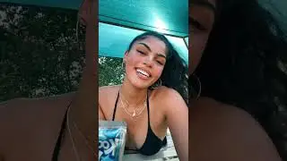 Radiant Woman Enjoying Refreshing Drink and Expressing Herself#radiantwoman #expressive