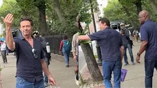 Watch Hugh Jackman jump into stranger&rsquo;s car to escape chaotic mob of fans