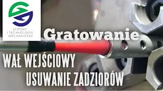 Gratowanie otwor&oacute;w przecinających - wał