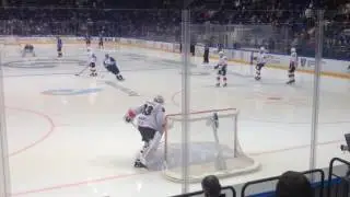 Goalie Pavel Francouz stretches before KHL game