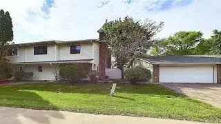 9343 Ranchview Lane N, Maple Grove, MN Presented by Thomas Moriarty.