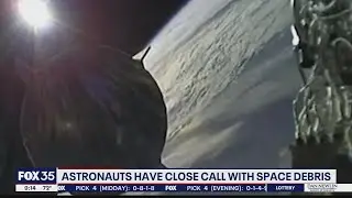 Astronauts have close call with space debris