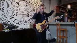 Feature Poet Ian Ferrier playing a poem 