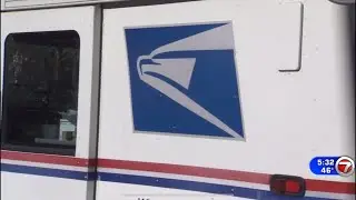 Mail carrier robbed at gun point