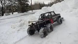 Redcat Gen8 plowing snow.
