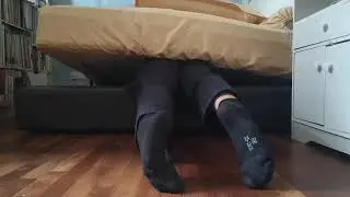 School boy got stuck under bed headfirst