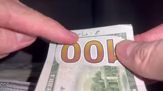Changing 100 dollar bills in the Philippines