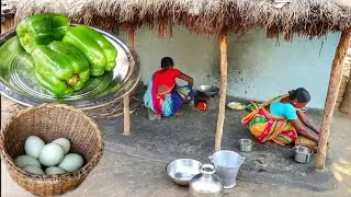 Santali tribe women cooking CAPSICUM EGG curry in their tradisional style for lunch||rural village