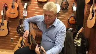 Fred Rocks playing Taylor Acoustic Guitar