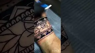 Leg band tattoo