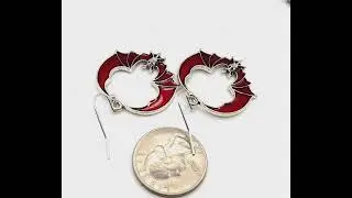 JOJI BOUTIQUE: Antiqued Silver Bat Circle Drop Earrings with Red Enamel