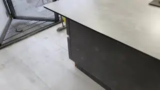 Kitchen island with compact worktop