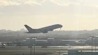 PLANE SPOTTING TAKES OFF AND LANDING AT SYDNEY AIRPORT IN DAY EVENING AND NIGHT.