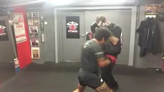 UFC mma fighter Vaughan Lee on the pads/body bag