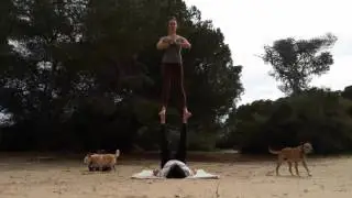 Acroyoga beach forest Foot to foot.