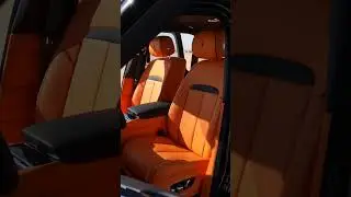 Diamond Black Meets Vibrant Orange: The Rolls-Royce Cullinan Onyx in Dubai's Best Car Showroom