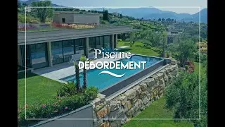 Piscine rectangulaire avec d&eacute;bordement