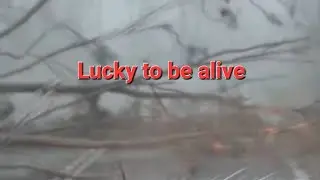 Car gets caught in Severe Storm / Supercell. 