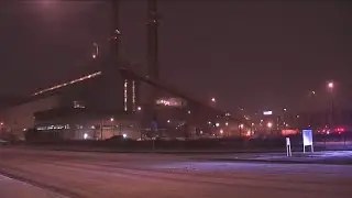 Elite firefighters rescue workers trapped on power plant stack