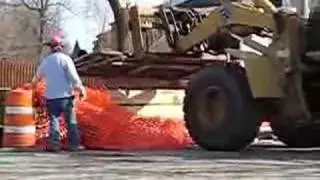 DiFazio- cat938g moving wood fences