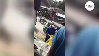 A python captured on a lamp post in Moragahahena.