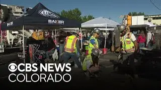 Young female students learn about construction jobs in Colorado in hands-on demonstrations