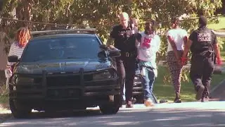 Mom arrested after child found wandering outside in Atlanta, police say