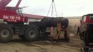 Uploading a heavy iron with crane