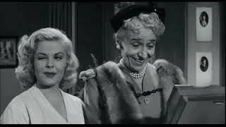 Over-Exposed 1956 directed by Lewis Seiler and starring Cleo Moore produced by Columbia Pictures.