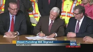 Pence signs $230M Indiana roads funding bill into law