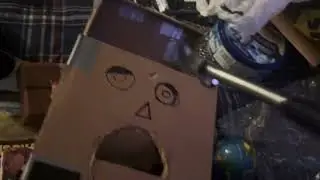 11,136: Nov 25th: Smashing the cardboard robot head with a hammer