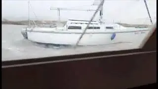 Our boat moored up in storm Dennis 2020 Jaguar 25 at shell island wales.
