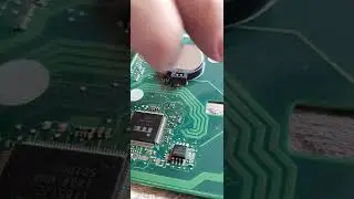 Securing the CMOS Battery when tabs broken with hot glue! Motherboard woes.