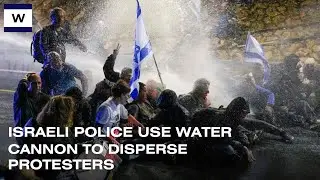 Israeli police use water cannon to disperse protesters blocking Tel Aviv highway