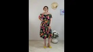 Vestito spalle scoperte e cintura taglie comode