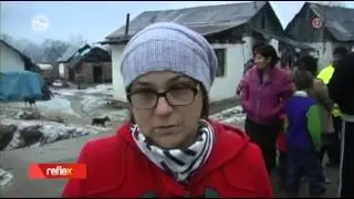 R.osada ktorej deti maju skole nizku absenciu